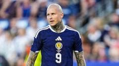 Millwall sign Scotland striker Dykes on one-year deal